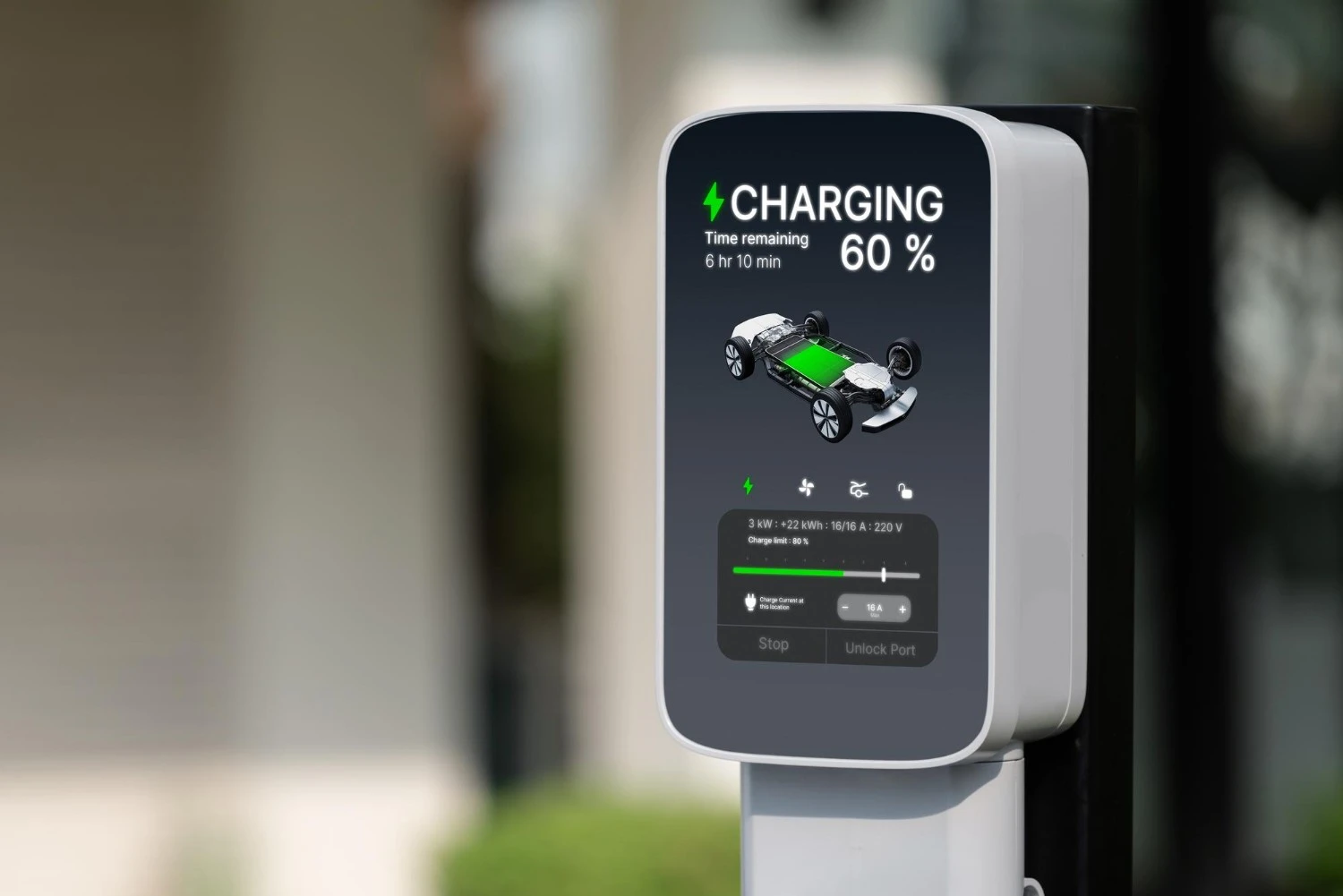 Close up of smart EV charger screen showing charging progress and battery percentage